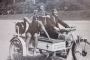 An early lifeguard rides with assistants...